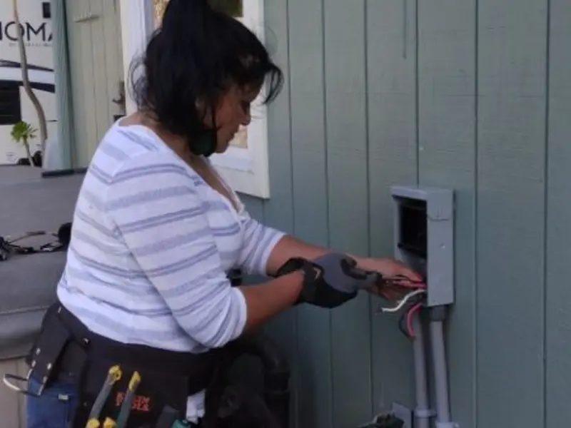 Licensed electrician wiring an exterior subpanel in Berkeley